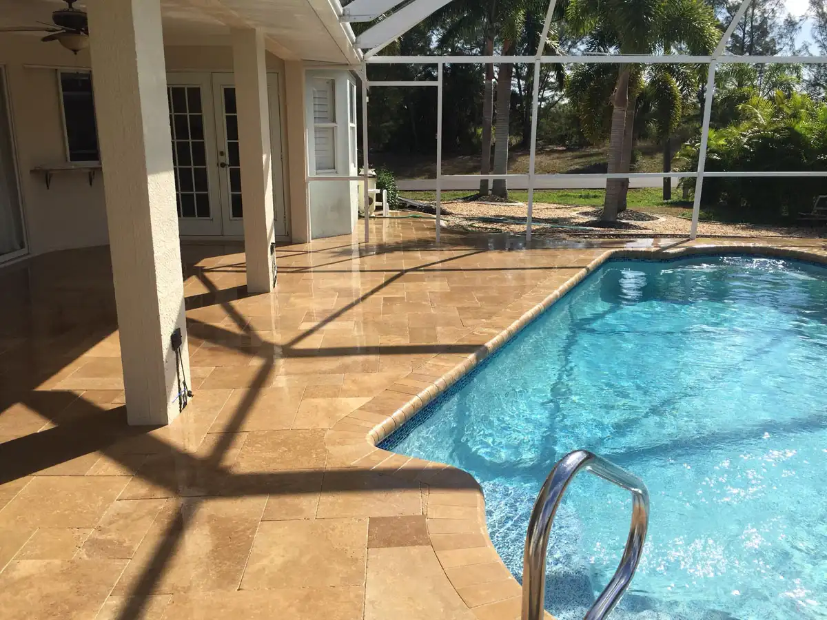 Freshly refinished fiberglass pool with bright blue finish